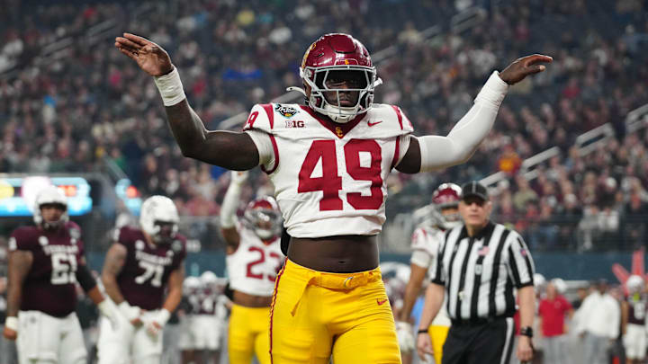 Dec 27, 2024; Las Vegas, NV, USA; Southern California Trojans defensive end Kameryn Fountain (49) celebrates against the Texas A&M Aggies in the first half at Allegiant Stadium. Mandatory Credit: Kirby Lee-Imagn Images Dec 27, 2024; Las Vegas, NV, USA; Southern California Trojans defensive end Kameryn Fountain (49) celebrates against the Texas A&M Aggies in the first half at Allegiant Stadium. Mandatory Credit: Kirby Lee-Imagn Images