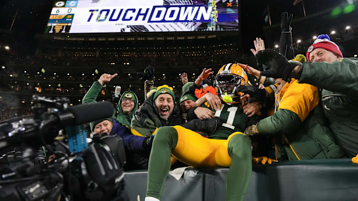 Green Bay Packers wide receiver Jayden Reed (11) celebrates after scoring a touchdown against the Miami Dolphins.