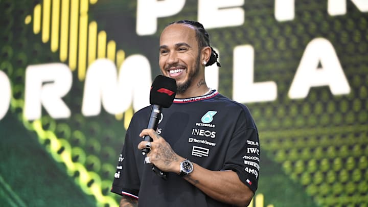 Oct 19, 2024; Austin, Texas, USA; Mercedes AMG Petronas F1 Team driver Lewis Hamilton (44) of Team Great Britain smiles to the crowd during a fan forum before the Sprint Race in the 2024 Formula One US Grand Prix at Circuit of the Americas. Mandatory Credit: Jerome Miron-Imagn Images Oct 19, 2024; Austin, Texas, USA; Mercedes AMG Petronas F1 Team driver Lewis Hamilton (44) of Team Great Britain smiles to the crowd during a fan forum before the Sprint Race in the 2024 Formula One US Grand Prix at Circuit of the Americas. Mandatory Credit: Jerome Miron-Imagn Images