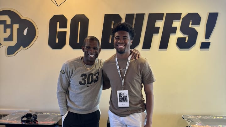 Narbonne QB Jaden O'Neal (right) with coach Deion Sanders of Colorado.