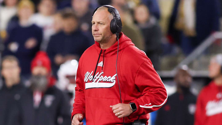 Nov 21, 2024; Atlanta, Georgia, USA; North Carolina State Wolfpack head coach Dave Doeren on the field against the Georgia Tech Yellow Jackets in the second quarter at Bobby Dodd Stadium at Hyundai Field. Mandatory Credit: Brett Davis-Imagn Images