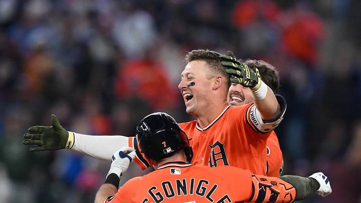 Detroit Tigers first baseman Spencer Torkelson (20) celebrates with teammate Zach McKinstry (39) and Kevin McGonigle (7) after hitting a walk-off RBI double. 