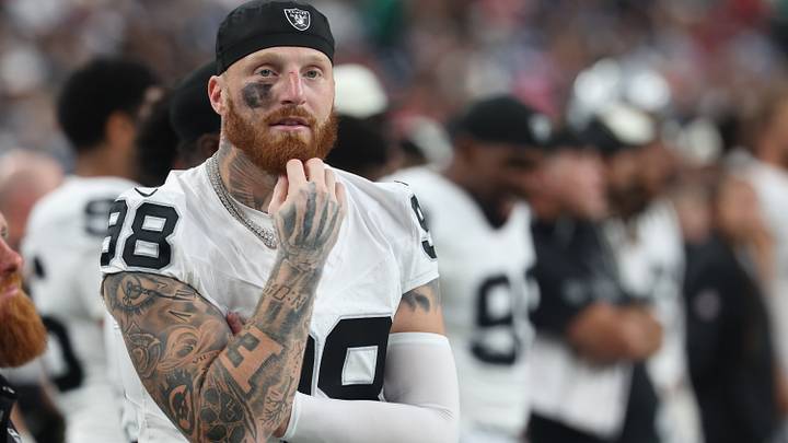 Las Vegas Raiders defensive end Maxx Crosby (98) watches the build board before the Raiders play the Houston Texans at Reliant Stadium. Mandatory Credit: Thomas Shea-Imagn Images
