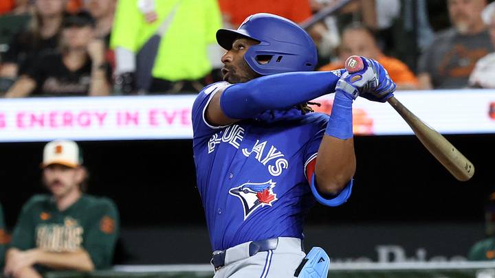 May 29, 2026; Baltimore, Maryland, USA; Toronto Blue Jays second baseman Charles McAdoo (26) hits his first career hit/home run during the seventh inning against the Baltimore Orioles at Oriole Park at Camden Yards. 
