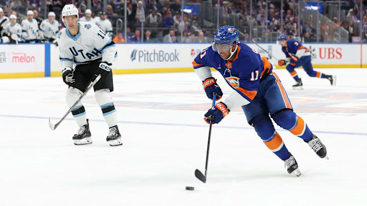 Oct 10, 2024; Elmont, New York, USA; New York Islanders left wing Anthony Duclair (11) skates with the puck against Utah Hockey Club right wing Dylan Guenther (11) during overtime at UBS Arena. Mandatory Credit: Brad Penner-Imagn Images Oct 10, 2024; Elmont, New York, USA; New York Islanders left wing Anthony Duclair (11) skates with the puck against Utah Hockey Club right wing Dylan Guenther (11) during overtime at UBS Arena. Mandatory Credit: Brad Penner-Imagn Images