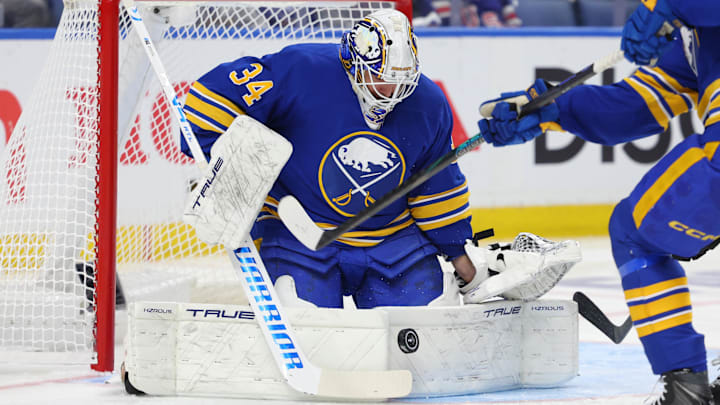 Apr 21, 2026; Buffalo, New York, USA; Buffalo Sabres goaltender Alex Lyon (34) makes a save during the third period against the Boston Bruins in game two of the first round of the 2026 Stanley Cup Playoffs at KeyBank Center. Mandatory Credit: Timothy T. Ludwig-Imagn Images