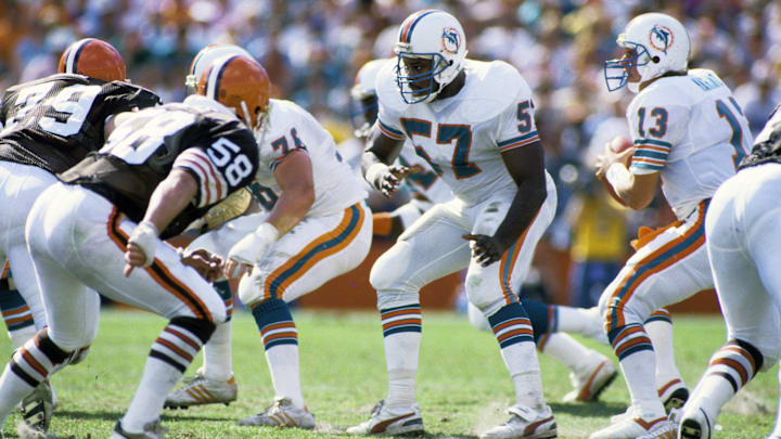 Miami Dolphins center Dwight Stephenson (57) in action during the 1985 AFC Divisional Playoff Game against the Cleveland Browns at the Orange Bowl.