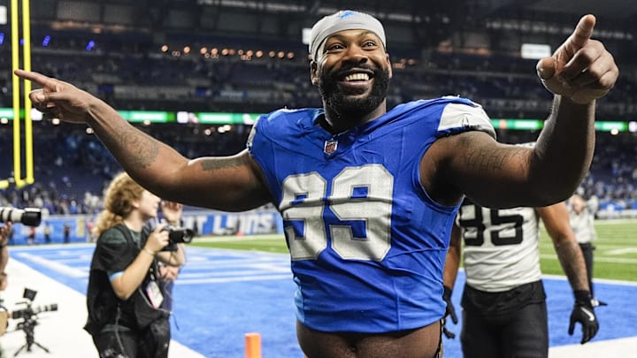 Nov 17, 2024; Detroit, MI, USA; Detroit Lions defensive end Za'Darius Smith (99) waves at fans as he exits the field after 52-6 win over Jacksonville Jaguars during the second half at Ford Field in Detroit on Sunday, Nov. 17, 2024. Mandatory Credit: Junfu Han/USA TODAY Network via Imagn Images 