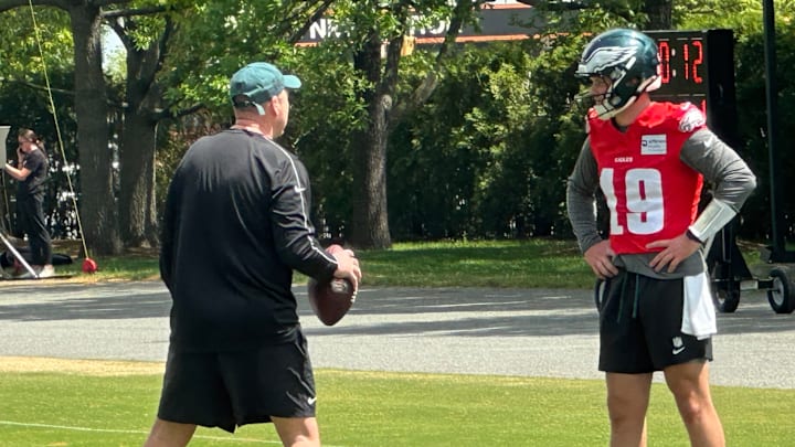Eagles QB coach Scott Loeffler tutors Kyle McCord on May 2, 2025 at Rookie Camp.
