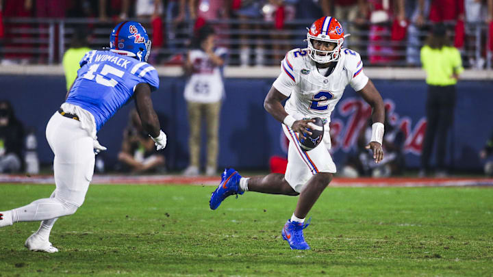 Nov 15, 2025; Oxford, Mississippi, USA; Florida Gators quarterback DJ Lagway (2) scrambles against the Mississippi Rebels at Vaught-Hemingway Stadium. Nov 15, 2025; Oxford, Mississippi, USA; Florida Gators quarterback DJ Lagway (2) scrambles against the Mississippi Rebels at Vaught-Hemingway Stadium.