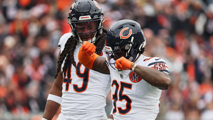 Nov 2, 2025; Cincinnati, Ohio, USA; Chicago Bears safety C.J. Gardner-Johnson (35) celebrates with linebacker Tremaine Edmunds (49) after sacking Cincinnati Bengals quarterback Joe Flacco (not pictured) during the second quarter at Paycor Stadium. Mandatory Credit: Joseph Maiorana-Imagn Images