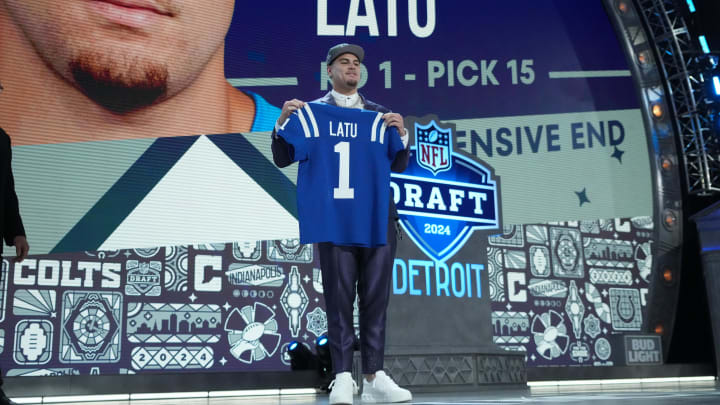 Apr 25, 2024; Detroit, MI, USA; UCLA Bruins defensive lineman Laiatu Latu poses after being selected Apr 25, 2024; Detroit, MI, USA; UCLA Bruins defensive lineman Laiatu Latu poses after being selected