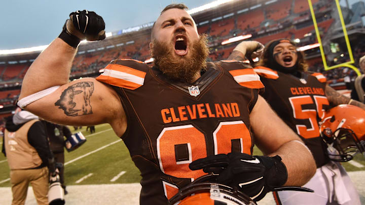 Dec 24, 2016; Cleveland, OH, USA; Cleveland Browns defensive end Jamie Meder (98) and nose tackle Danny Shelton (55) celebrate after the Cleveland Browns beat the San Diego Chargers at FirstEnergy Stadium. The Browns won 20-17. Mandatory Credit: Ken Blaze-USA TODAY Sports