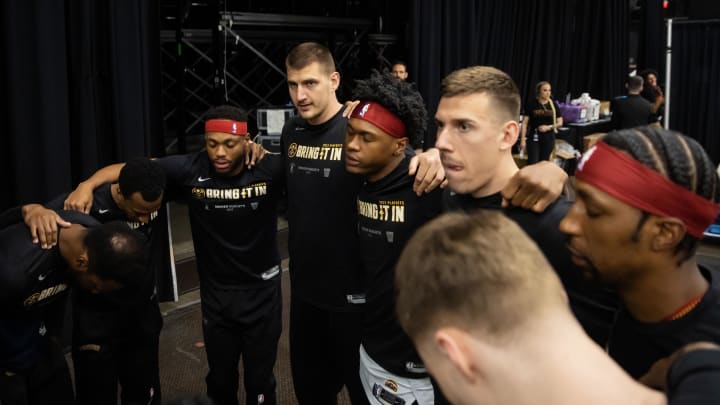 May 5, 2023; Phoenix, Arizona, USA; Denver Nuggets center Nikola Jokic (center) in the huddle with teammates prior to the game against the Phoenix Suns in game three of the 2023 NBA playoffs at Footprint Center. Mandatory Credit: Mark J. Rebilas-USA TODAY Sports
