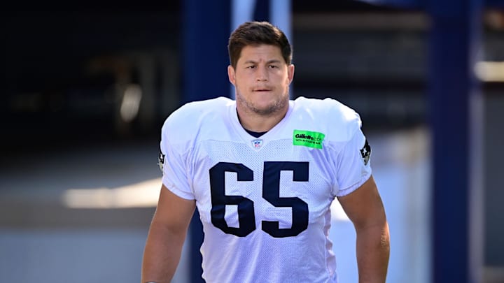 Aug 2, 2023; Foxborough, MA, USA; New England Patriots guard James Ferentz (65) heads to the practice fields at Gillette Stadium. Mandatory Credit: Eric Canha-Imagn Images
