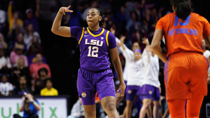 Jan 19, 2025; Gainesville, Florida, USA; LSU Tigers guard Mikaylah Williams (12) gestures after making a three-point basket against the Florida Gators during the first half at Exactech Arena at the Stephen C. O'Connell Center. Mandatory Credit: Matt Pendleton-Imagn Images