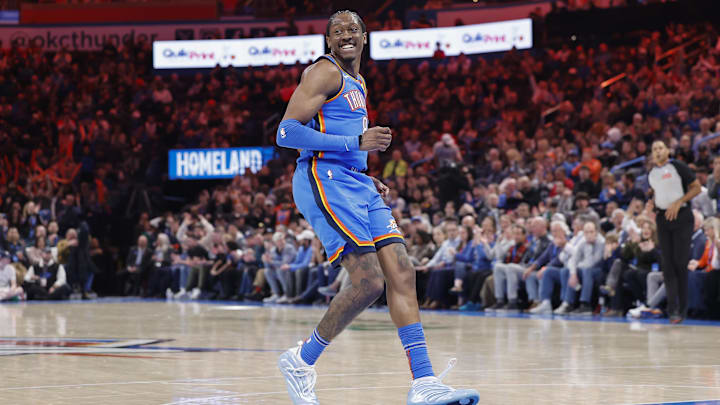 Feb 12, 2025; Oklahoma City, Oklahoma, USA; Oklahoma City Thunder forward Jalen Williams (8) smiles after scoring against the Miami Heat during the second half at Paycom Center. 
