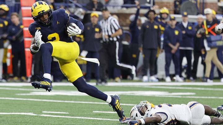 Michigan Wolverines wide receiver Andrew Marsh runs to the end zone for touchdown against the Texas El Paso Miners Michigan Wolverines wide receiver Andrew Marsh runs to the end zone for touchdown against the Texas El Paso Miners