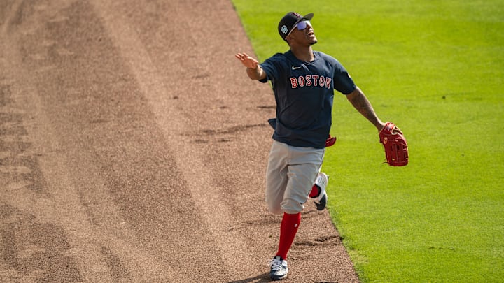 Ceddane Rafaela chases down a fly ball prior to a Red Sox spring training game.