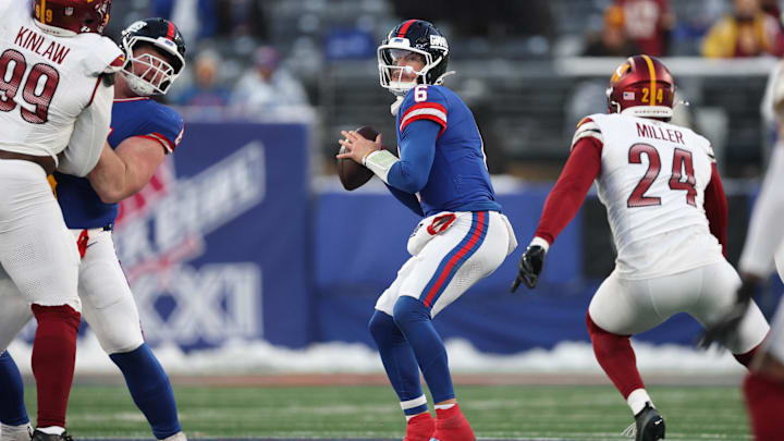 Dec 14, 2025; East Rutherford, New Jersey, USA;  New York Giants quarterback Jaxson Dart (6) looks to pass during the fourth quarter against the Washington Commanders at MetLife Stadium. Mandatory Credit: Vincent Carchietta-Imagn Images