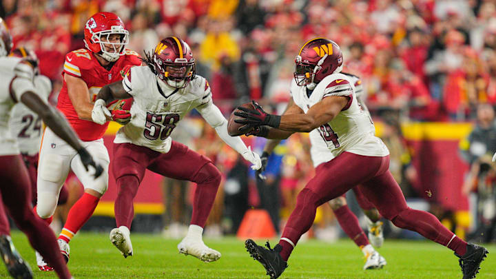 Oct 27, 2025; Kansas City, Missouri, USA; Washington Commanders middle linebacker Bobby Wagner (54) intercepts a pass against the Kansas City Chiefs during the second quarter of the game at GEHA Field at Arrowhead Stadium. Mandatory Credit: Jay Biggerstaff-Imagn Images Oct 27, 2025; Kansas City, Missouri, USA; Washington Commanders middle linebacker Bobby Wagner (54) intercepts a pass against the Kansas City Chiefs during the second quarter of the game at GEHA Field at Arrowhead Stadium. Mandatory Credit: Jay Biggerstaff-Imagn Images