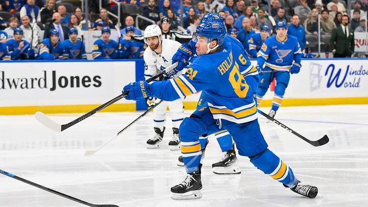 Mar 28, 2026; St. Louis, Missouri, USA; St. Louis Blues left wing Dylan Holloway (81) shoots against the Toronto Maple Leafs during the second period at Enterprise Center. Mandatory Credit: Jeff Curry-Imagn Images Mar 28, 2026; St. Louis, Missouri, USA; St. Louis Blues left wing Dylan Holloway (81) shoots against the Toronto Maple Leafs during the second period at Enterprise Center. Mandatory Credit: Jeff Curry-Imagn Images
