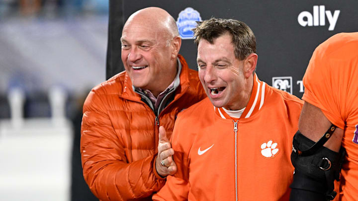 Dec 7, 2024; Charlotte, NC, USA; Clemson Tigers head coach Dabo Swinney with Clemson president Jim Clements after winning the 2024 ACC Championship game at Bank of America Stadium. Bob Donnan-Imagn Images