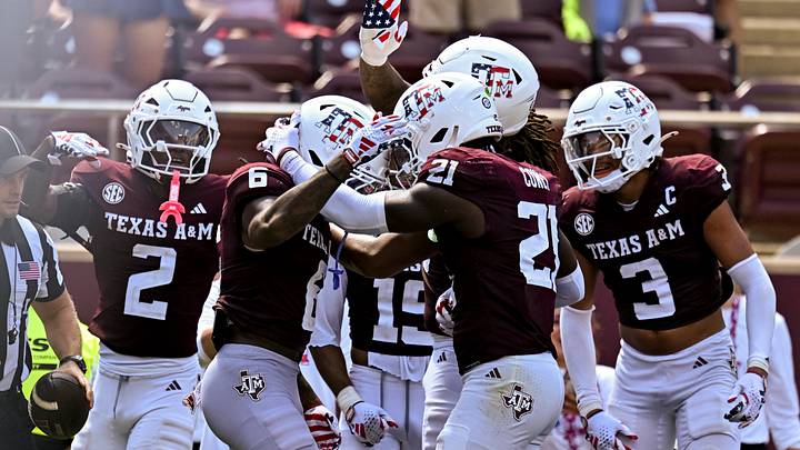 Texas A&M Aggies cornerback Julio Humphrey (6) celebrates with teammates after running an interception back for a touchdown against Arizona State Sun Devils at Kyle Field. Texas A&M Aggies cornerback Julio Humphrey (6) celebrates with teammates after running an interception back for a touchdown against Arizona State Sun Devils at Kyle Field.