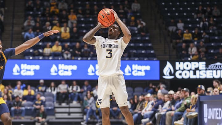 Dec 3, 2025; Morgantown, West Virginia, USA; West Virginia Mountaineers guard Honor Huff (3) shoots a three pointer during the second half against the Coppin State Eagles at Hope Coliseum. Mandatory Credit: Ben Queen-Imagn Images Dec 3, 2025; Morgantown, West Virginia, USA; West Virginia Mountaineers guard Honor Huff (3) shoots a three pointer during the second half against the Coppin State Eagles at Hope Coliseum. Mandatory Credit: Ben Queen-Imagn Images