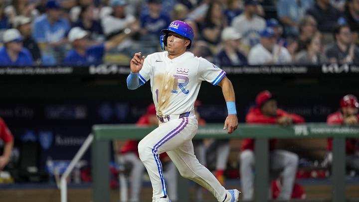 Apr 25, 2026; Kansas City, Missouri, USA; Kansas City Royals left fielder Isaac Collins (1) scores a run during the seventh inning against the Los Angeles Angels at Kauffman Stadium. Mandatory Credit: Jay Biggerstaff-Imagn Images