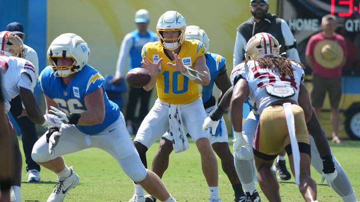 Aug 18, 2026; El Segundo, CA, USA; Los Angeles Chargers quarterback Justin Herbert (10) takes the snap from center Jake Slaughter (66) during joint practice against the San Francisco 49ers at The Bolt. Mandatory Credit: Kirby Lee-Imagn Images Aug 18, 2026; El Segundo, CA, USA; Los Angeles Chargers quarterback Justin Herbert (10) takes the snap from center Jake Slaughter (66) during joint practice against the San Francisco 49ers at The Bolt. Mandatory Credit: Kirby Lee-Imagn Images