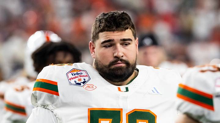 Jan 8, 2026; Glendale, AZ, USA; Miami Hurricanes offensive lineman Ryan Rodriguez (76) against the Mississippi Rebels during the 2026 Fiesta Bowl and semifinal game of the College Football Playoff at State Farm Stadium. Mandatory Credit: Mark J. Rebilas-Imagn Images Jan 8, 2026; Glendale, AZ, USA; Miami Hurricanes offensive lineman Ryan Rodriguez (76) against the Mississippi Rebels during the 2026 Fiesta Bowl and semifinal game of the College Football Playoff at State Farm Stadium. Mandatory Credit: Mark J. Rebilas-Imagn Images