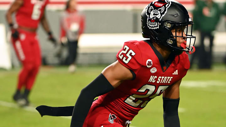Nov 4, 2023; Raleigh, North Carolina, USA; North Carolina State Wolfpack defensive back Brandon Cisse (25) warms up prior to a game against the Miami Hurricanes at Carter-Finley Stadium. Mandatory Credit: Rob Kinnan-Imagn Images