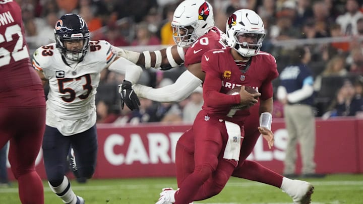 Arizona Cardinals quarterback Kyler Murray (1) runs through a hole past Chicago Bears linebacker T.J. Edwards (53) during the third quarter at State Farm Stadium on Nov 3, 2024, in Glendale. Arizona Cardinals quarterback Kyler Murray (1) runs through a hole past Chicago Bears linebacker T.J. Edwards (53) during the third quarter at State Farm Stadium on Nov 3, 2024, in Glendale.