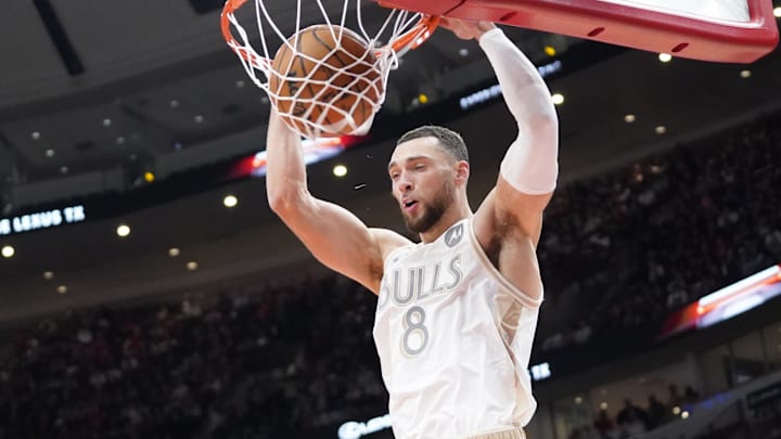 Jan 25, 2025; Chicago, Illinois, USA; Chicago Bulls guard Zach LaVine (8) dunks the ball against the Philadelphia 76ers during the first quarter at United Center. Mandatory Credit: David Banks-Imagn Images