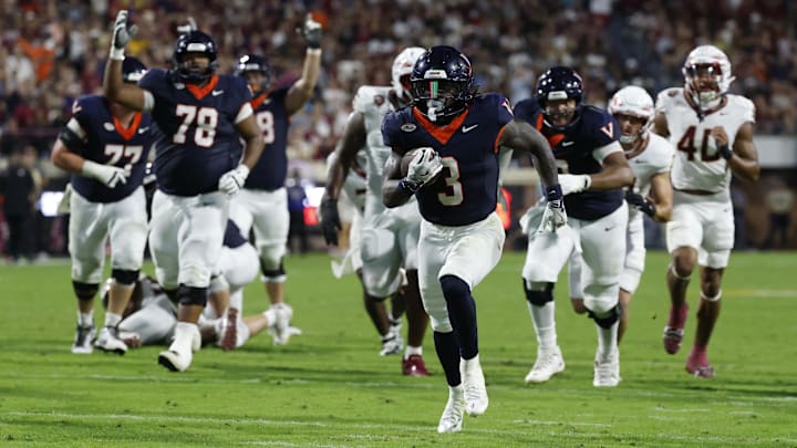 Sep 26, 2025; Charlottesville, Virginia, USA; Virginia Cavaliers running back J'Mari Taylor (3) scores a touchdown against the Florida State Seminoles during the second quarter at Scott Stadium. Mandatory Credit: Geoff Burke-Imagn Images