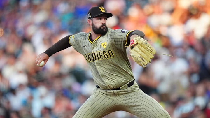 Aug 16, 2024; Denver, Colorado, USA; San Diego Padres starting pitcher Matt Waldron (61) delivers a pitch in the fourth inning against the Colorado Rockies at Coors Field. Mandatory Credit: Ron Chenoy-Imagn Images