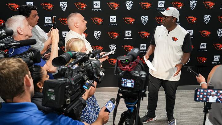 Oregon State head coach JaMarcus Shephard, right, talks to the media after the Oregon State fall camp practice at Reser Stadium on Wednesday, Aug. 5, 2026, in Corvallis, Oregon. Oregon State head coach JaMarcus Shephard, right, talks to the media after the Oregon State fall camp practice at Reser Stadium on Wednesday, Aug. 5, 2026, in Corvallis, Oregon.
