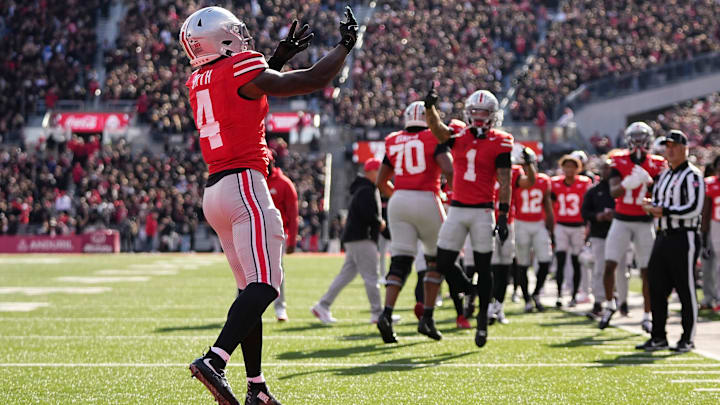 Ohio State Buckeyes wide receiver Jeremiah Smith (4) celebrates a touchdown during the NCAA football game against the Penn State Nittany Lions at Ohio Stadium in Columbus on Nov. 1, 2025.