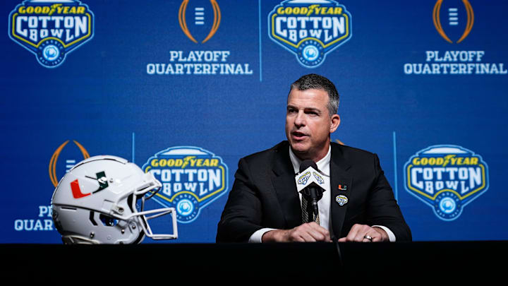 Miami (FL) Hurricanes head coach Mario Cristobal talks to media during a Cotton Bowl press conference at AT&T Stadium in Arlington, Texas prior to their College Football Playoff quarterfinal matchup on Dec. 30, 2025.