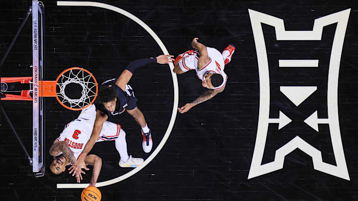 Jan 3, 2026; Cincinnati, Ohio, USA; Houston Cougars guard Ramon Walker Jr. (3) shoots against Cincinnati Bearcats forward Baba Miller (18) in the first half at Fifth Third Arena. Mandatory Credit: Katie Stratman-Imagn Images Jan 3, 2026; Cincinnati, Ohio, USA; Houston Cougars guard Ramon Walker Jr. (3) shoots against Cincinnati Bearcats forward Baba Miller (18) in the first half at Fifth Third Arena. Mandatory Credit: Katie Stratman-Imagn Images