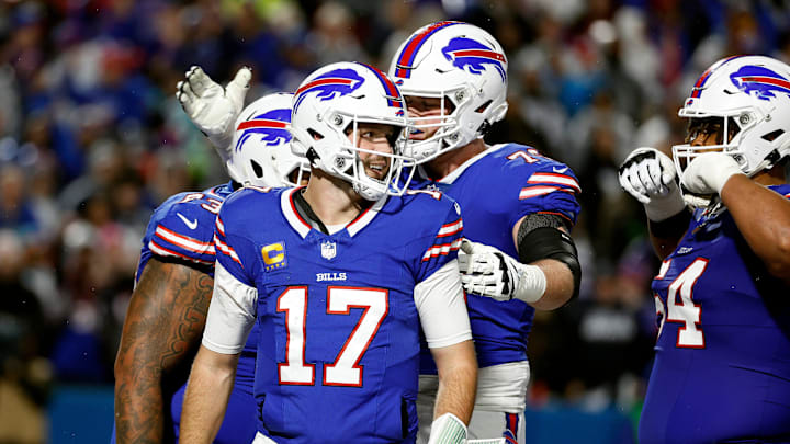 Buffalo Bills quarterback Josh Allen (17) celebrates his 1-yard touchdown run against the Cowboys.