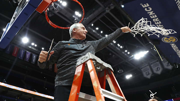 Mar 13, 2022; Tampa, FL, USA; Tennessee Volunteers head coach Rick Barnes cuts down the net after defeating the Texas A&M Aggies at Amalie Arena. Mandatory Credit: Kim Klement-Imagn Images