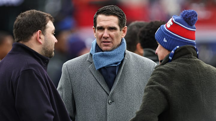 New York Giants general manager Joe Schoen, center, on the field before the game against the Baltimore Ravens at MetLife Stadium. New York Giants general manager Joe Schoen, center, on the field before the game against the Baltimore Ravens at MetLife Stadium.
