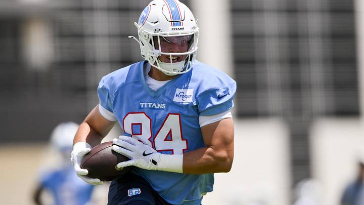 Jun 16, 2026; Nashville, TN, USA;  Tennessee Titans tight end Gunnar Helm (84) runs with the ball after a made catch during day 1 of mini-camp at Vanderbilt Health Football Center. Mandatory Credit: Steve Roberts-Imagn Images