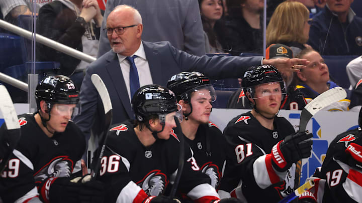 Apr 5, 2025; Buffalo, New York, USA;  Buffalo Sabres head coach Lindy Ruff talks to his team during the second period against the Tampa Bay Lightning at KeyBank Center. Mandatory Credit: Timothy T. Ludwig-Imagn Images