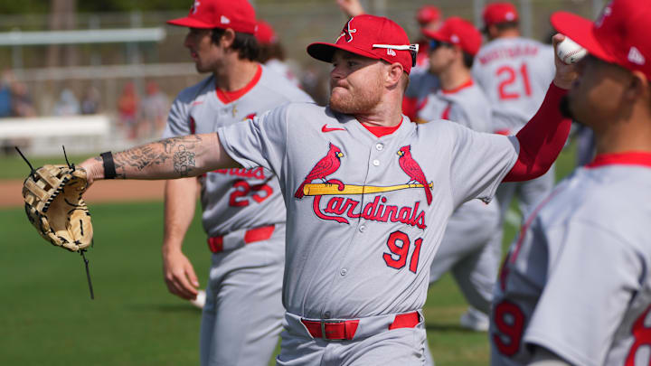 Feb 17, 2025; Jupiter, FL, USA;  St. Louis Cardinals outfielder Nathan Church (91) warms up during spring training. Mandatory Credit: Jim Rassol-Imagn Images