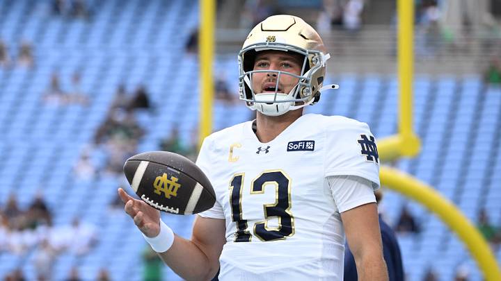 Oct 3, 2026; Chapel Hill, North Carolina, USA; Notre Dame Fighting Irish quarterback CJ Carr (13) during warm ups at Kenan Stadium. Oct 3, 2026; Chapel Hill, North Carolina, USA; Notre Dame Fighting Irish quarterback CJ Carr (13) during warm ups at Kenan Stadium.
