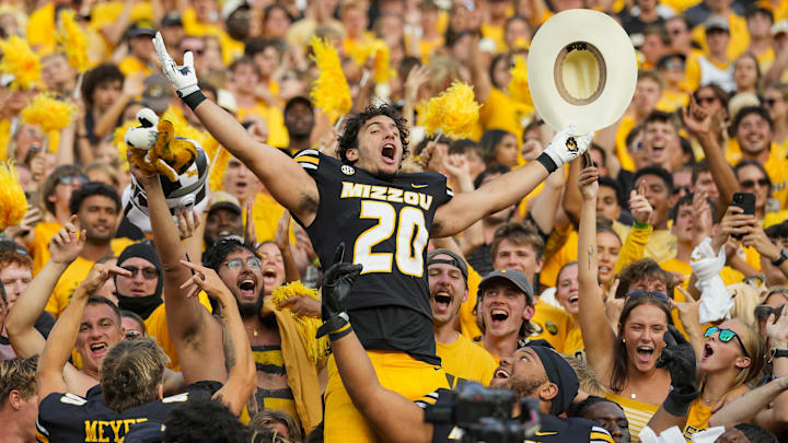 Missouri Tigers linebacker Nicholas Rodriguez (20) celebrates with teammates after a win versus the Kansas Jayhawks this season.