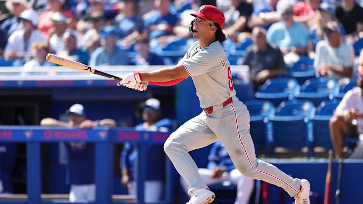 Feb 26, 2025; Dunedin, Florida, USA; Philadelphia Phillies outfielder Gabriel Rincones Jr. (85) hits a solo home run against the Toronto Blue Jays in the third inning during spring training at TD Ballpark.